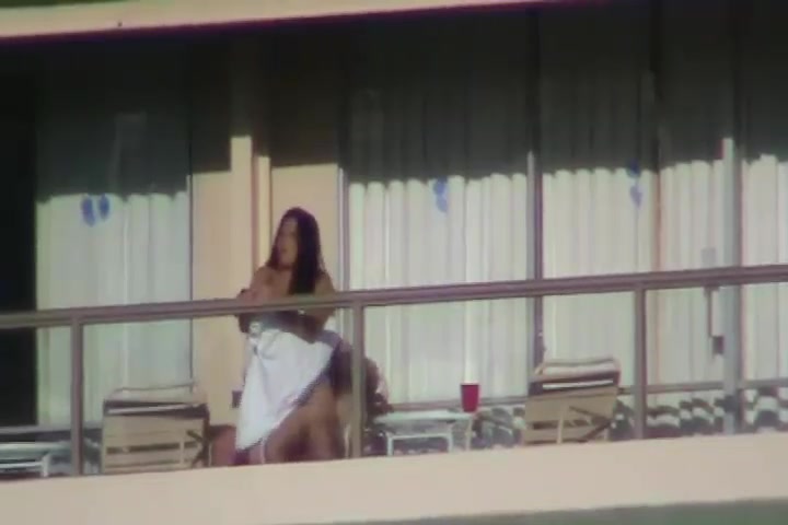 Couple Caught Having Sex - Horny young couple caught by spy cam fucking on balcony